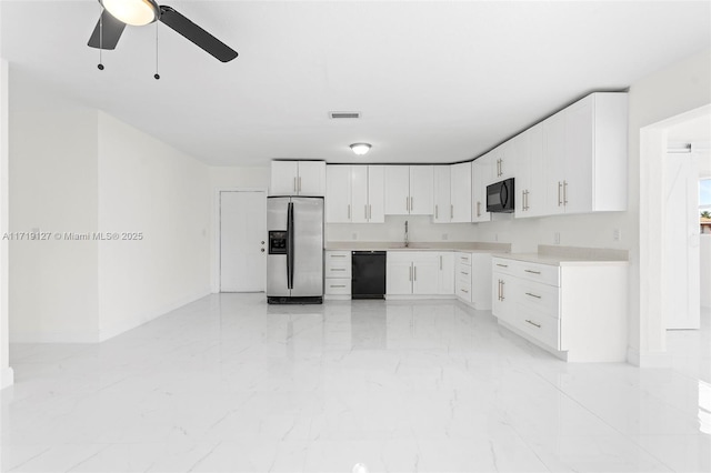 kitchen featuring white cabinets, sink, ceiling fan, and black appliances