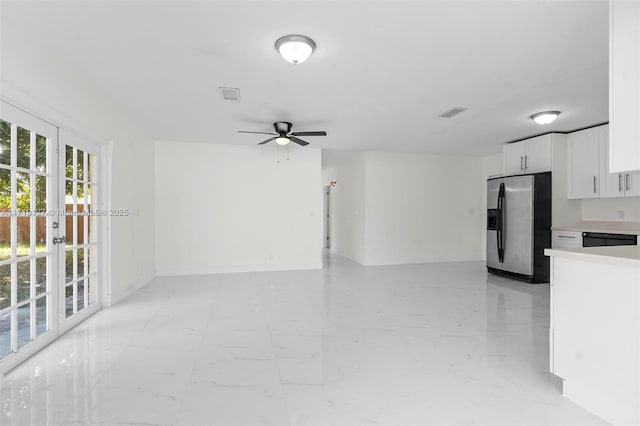 interior space with white cabinetry, dishwasher, ceiling fan, and stainless steel refrigerator with ice dispenser