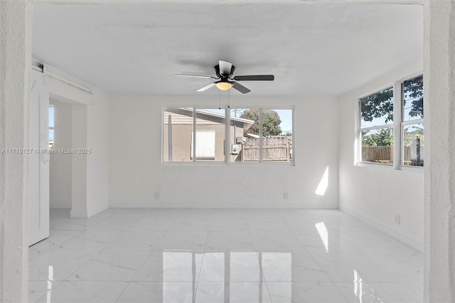 empty room with ceiling fan