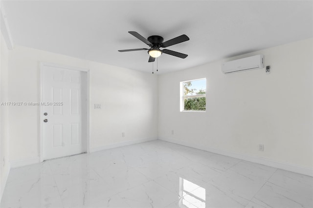 spare room featuring ceiling fan and a wall unit AC