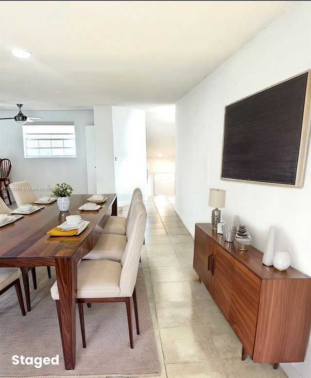 dining space with ceiling fan