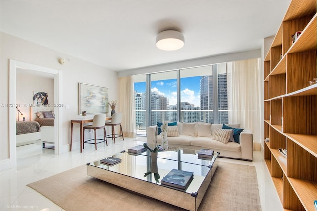 living room with light tile patterned floors and expansive windows