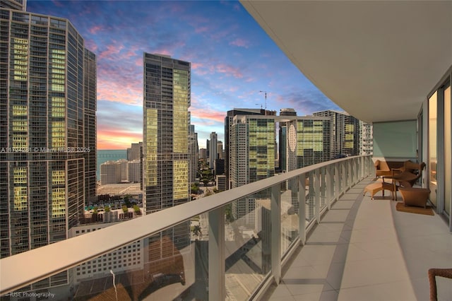 view of balcony at dusk