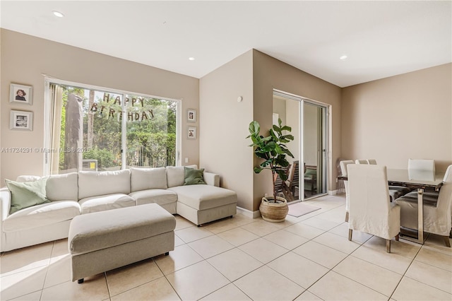 living room featuring light tile patterned flooring