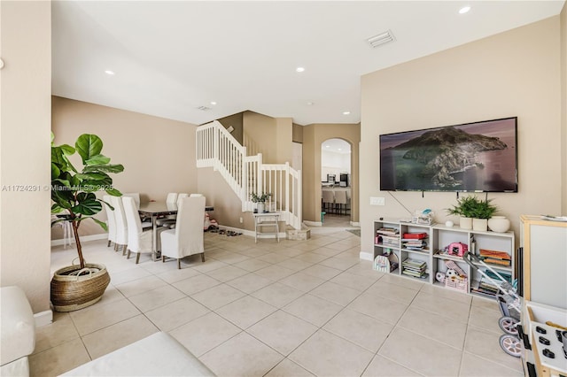 living room with light tile patterned flooring