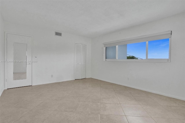 4848 NE 23rd Ave Unit 2C, Fort Lauderdale, FL 33308 - empty room with baseboards and visible vents