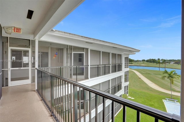 balcony featuring a water view