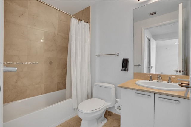 full bathroom with tile patterned flooring, vanity, toilet, and shower / tub combo