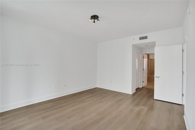 empty room featuring light hardwood / wood-style flooring