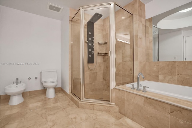 bathroom featuring toilet, separate shower and tub, and a bidet