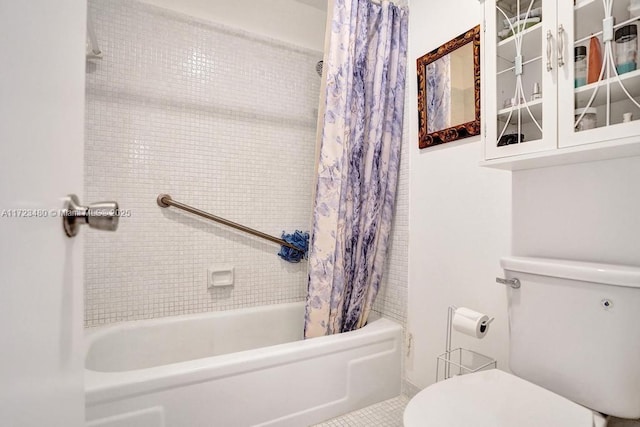 bathroom with shower / bath combination with curtain, tile patterned floors, and toilet