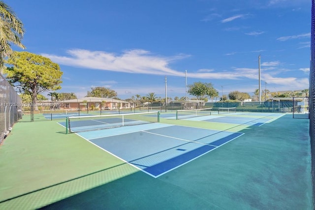 view of sport court featuring basketball hoop