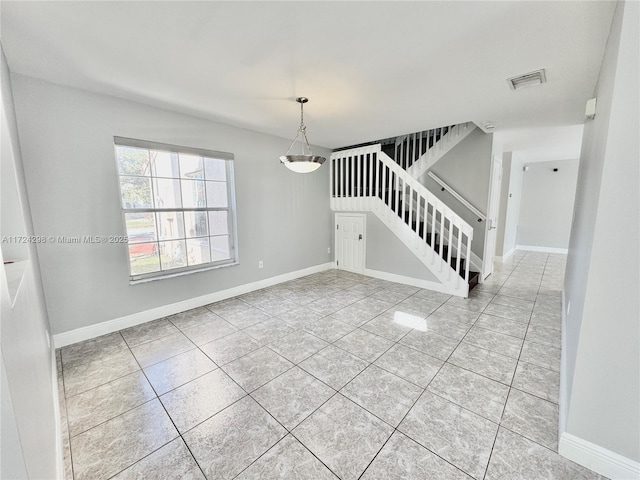 interior space featuring light tile patterned floors