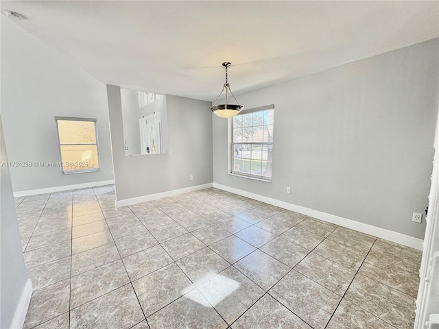 spare room with light tile patterned floors