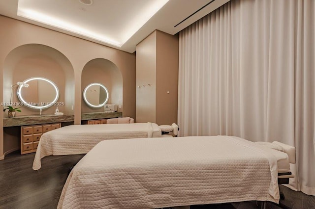 bedroom featuring dark hardwood / wood-style flooring