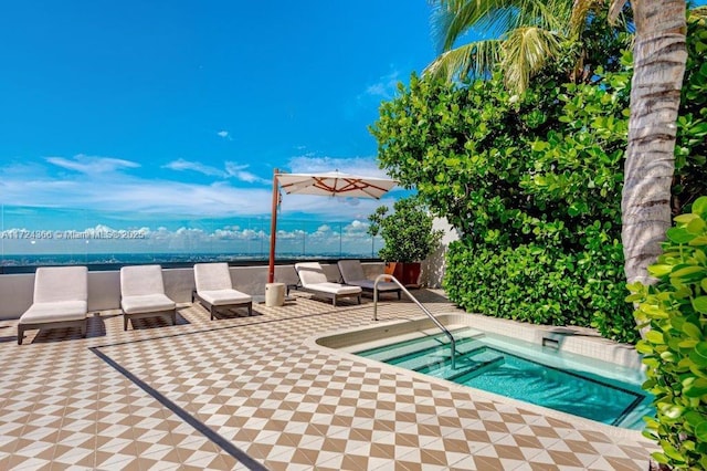 view of pool featuring an outdoor living space and an in ground hot tub