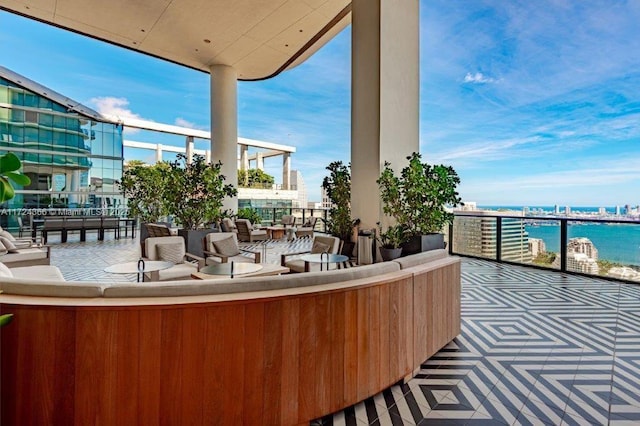 view of patio / terrace with a water view