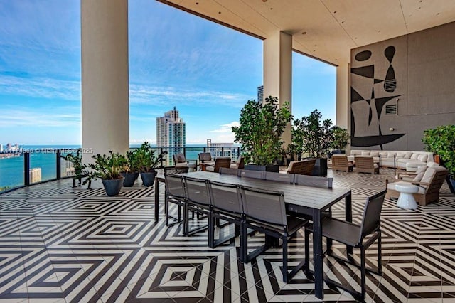 view of patio featuring a water view and an outdoor hangout area