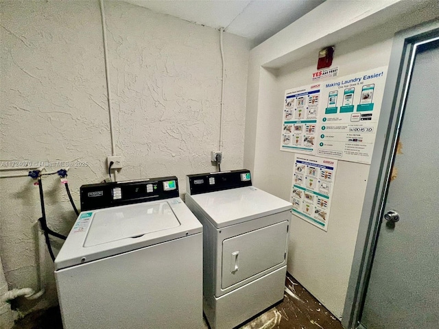 washroom with washer and clothes dryer