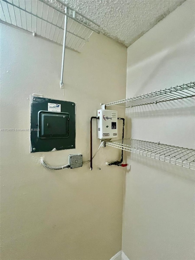 utility room featuring electric panel