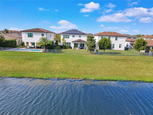 exterior space with a water view