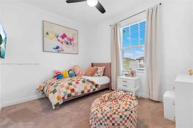 bedroom featuring light colored carpet, ceiling fan, and ornamental molding