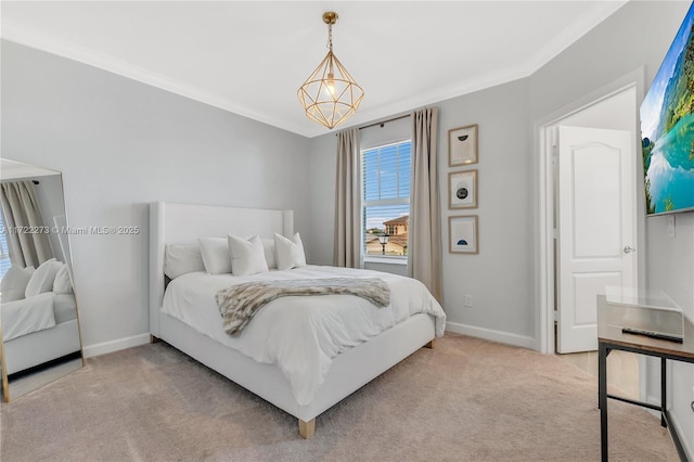 carpeted bedroom featuring crown molding