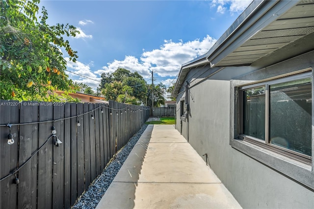 view of property exterior featuring a patio