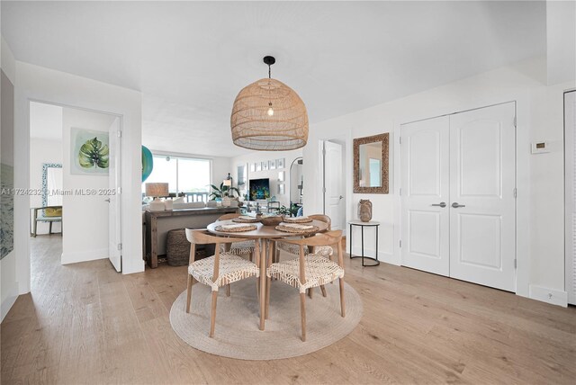 dining room featuring light hardwood / wood-style floors