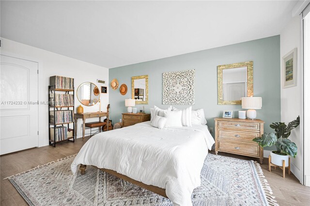 bedroom featuring dark hardwood / wood-style floors