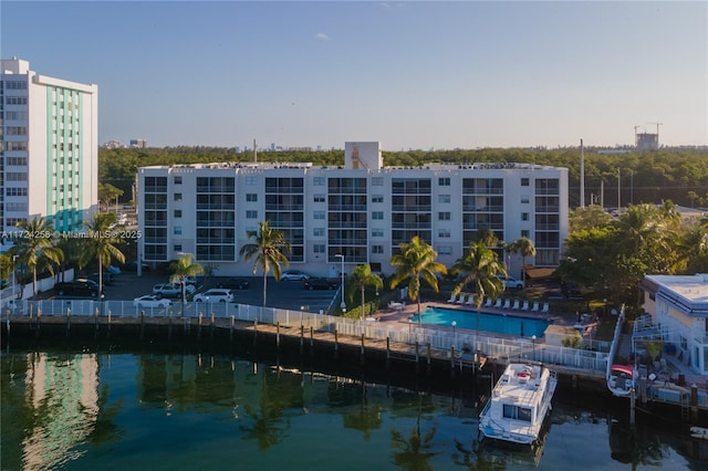 view of building exterior with a water view