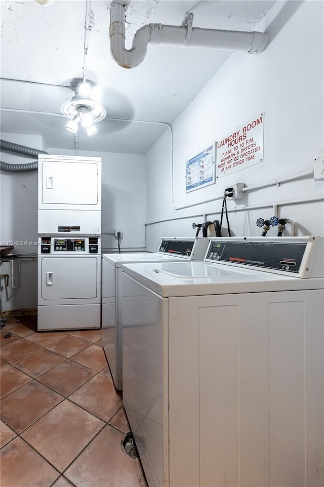 clothes washing area featuring tile patterned floors, separate washer and dryer, ceiling fan, and stacked washer / drying machine