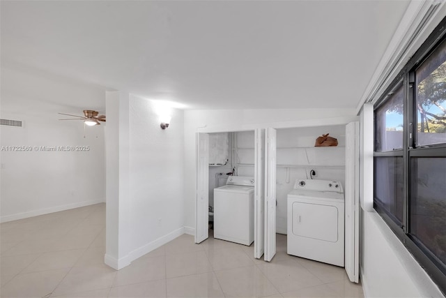 washroom featuring light tile patterned floors, hookup for an electric dryer, and ceiling fan