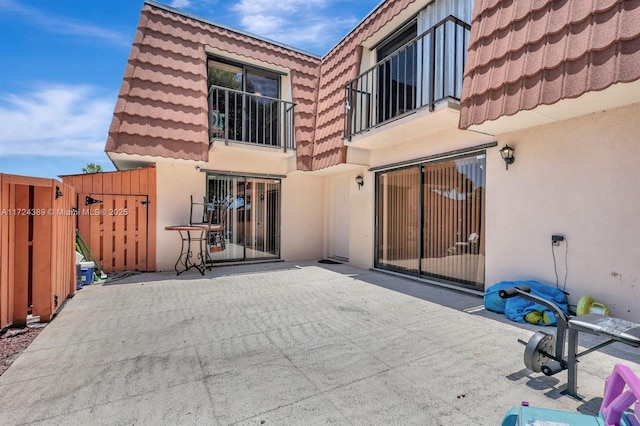 rear view of house featuring a patio area