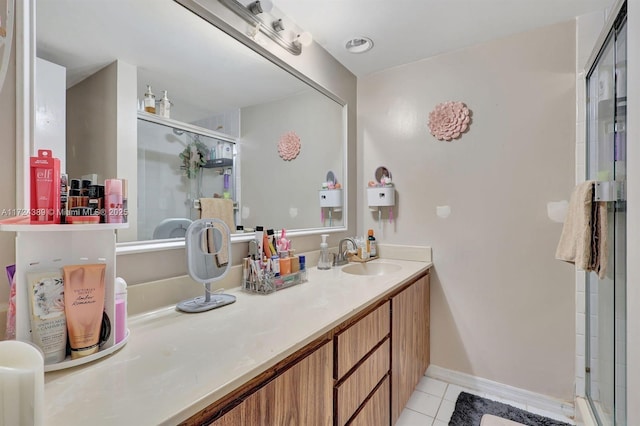 bathroom with tile patterned flooring, vanity, and an enclosed shower