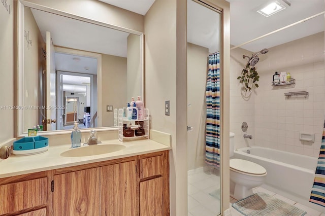 full bathroom with tile patterned floors, vanity, toilet, and shower / tub combo with curtain