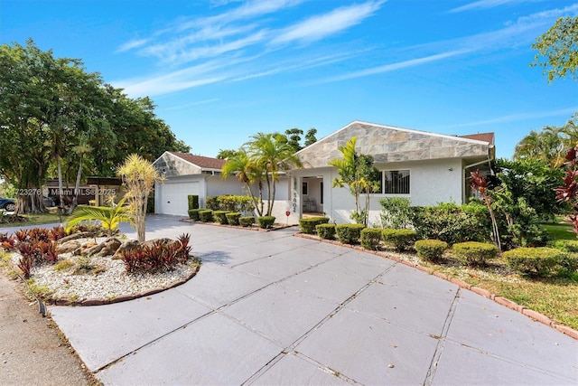 ranch-style house with a garage