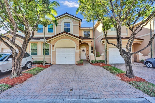 view of front of home with a garage