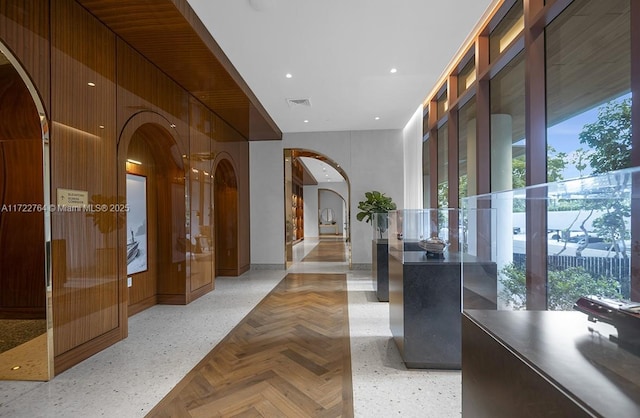 2655 S Bayshore Dr Unit 1212, Coconut Grove, FL 33133 - hall featuring french doors, visible vents, arched walkways, and recessed lighting