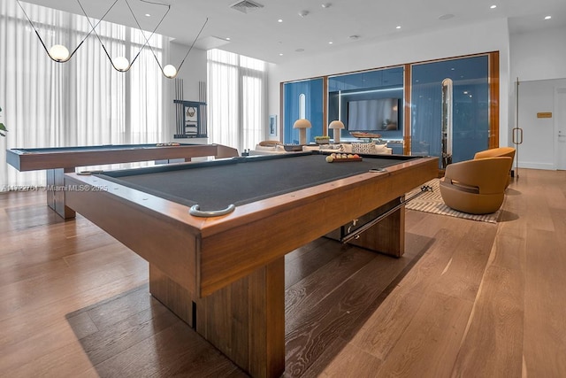 recreation room featuring pool table and hardwood / wood-style floors