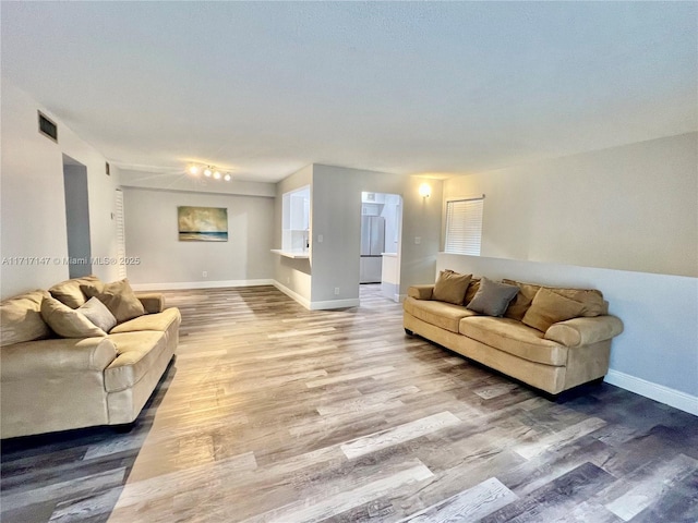 living room featuring light hardwood / wood-style flooring