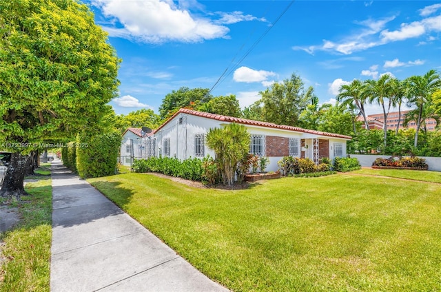 view of front of house with a front yard