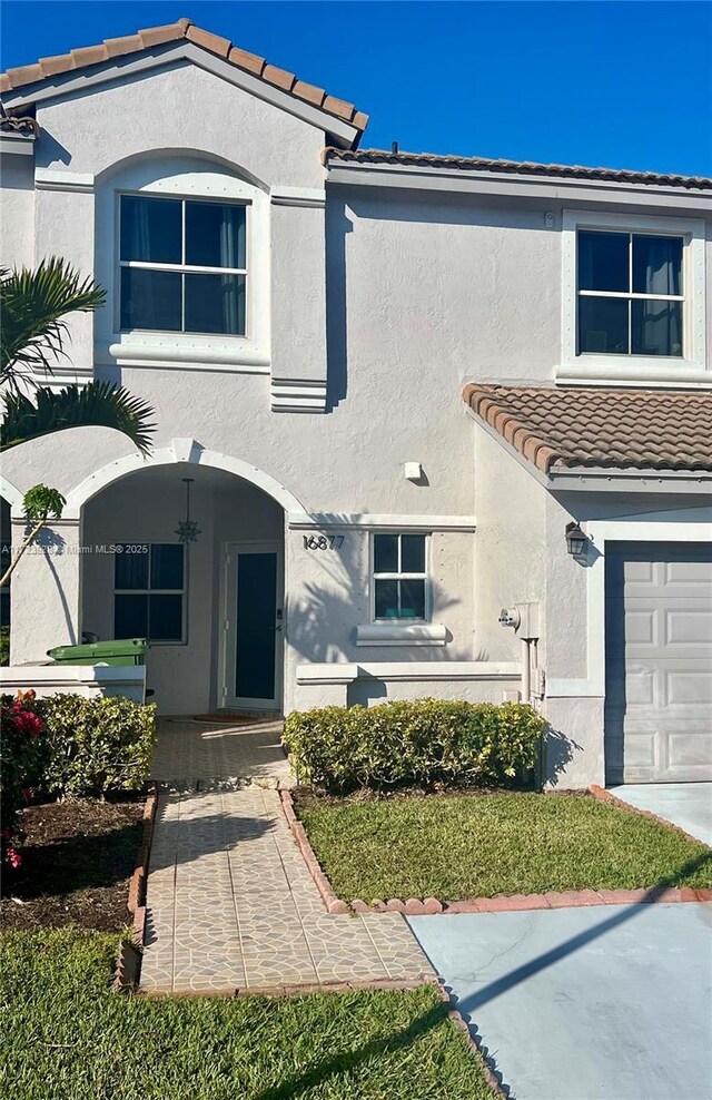 view of front of house with a garage