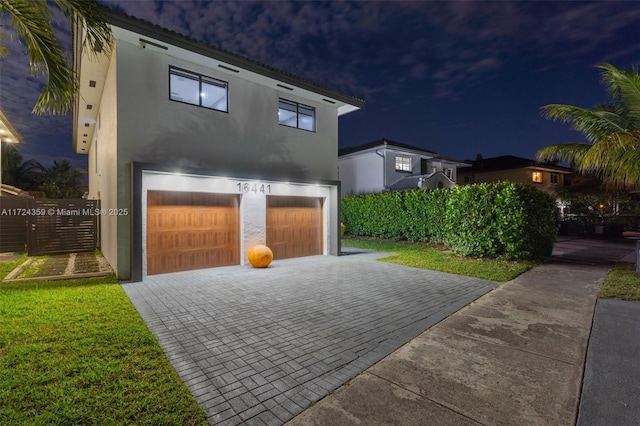 view of front of home featuring a garage