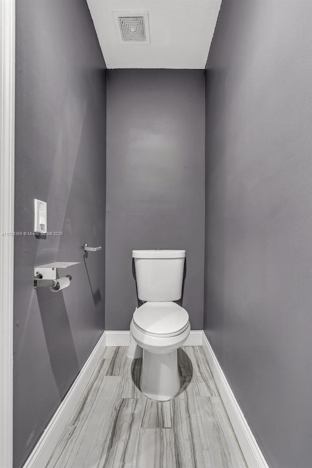 bathroom featuring toilet