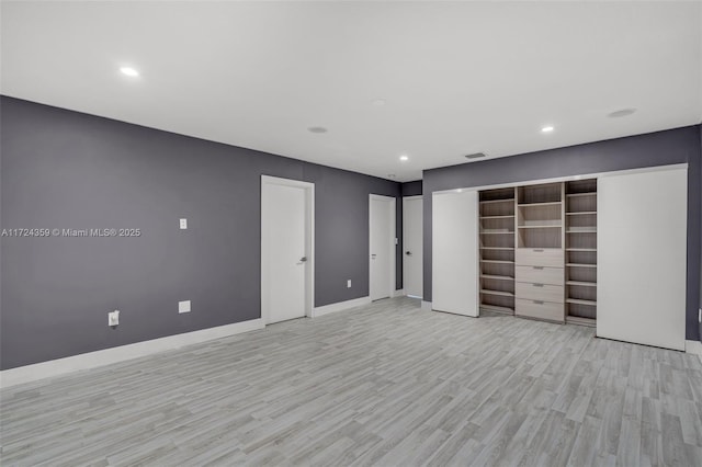 unfurnished bedroom featuring light hardwood / wood-style floors