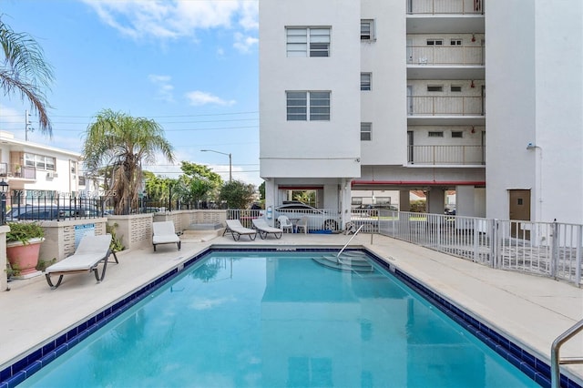 view of pool featuring a patio