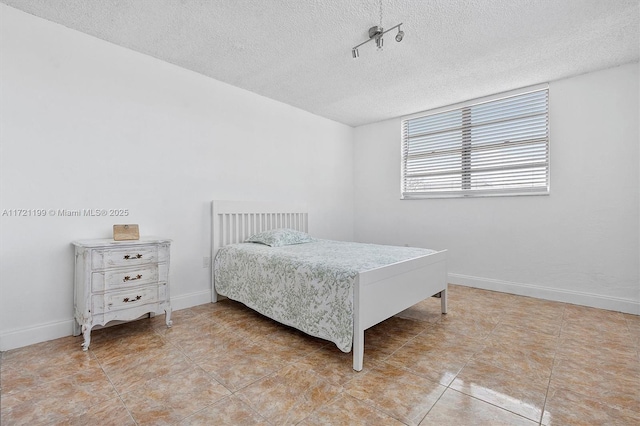 bedroom with a textured ceiling