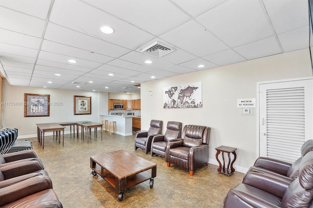 2450 NE 135th St Unit 406, North Miami, FL 33181 - living area with a paneled ceiling and recessed lighting