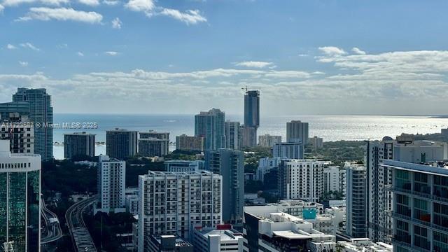 city view with a water view